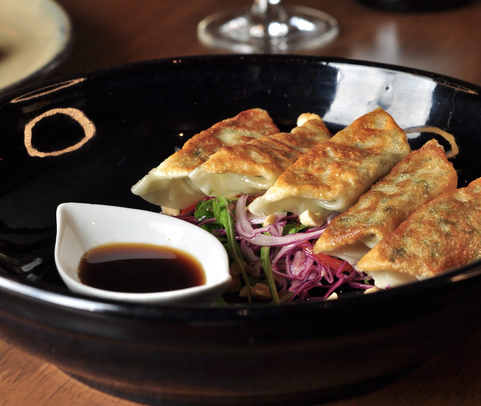 Crispy gyoza with soy dipping sauce at Downunder Australian fusion restaurant Lisbon