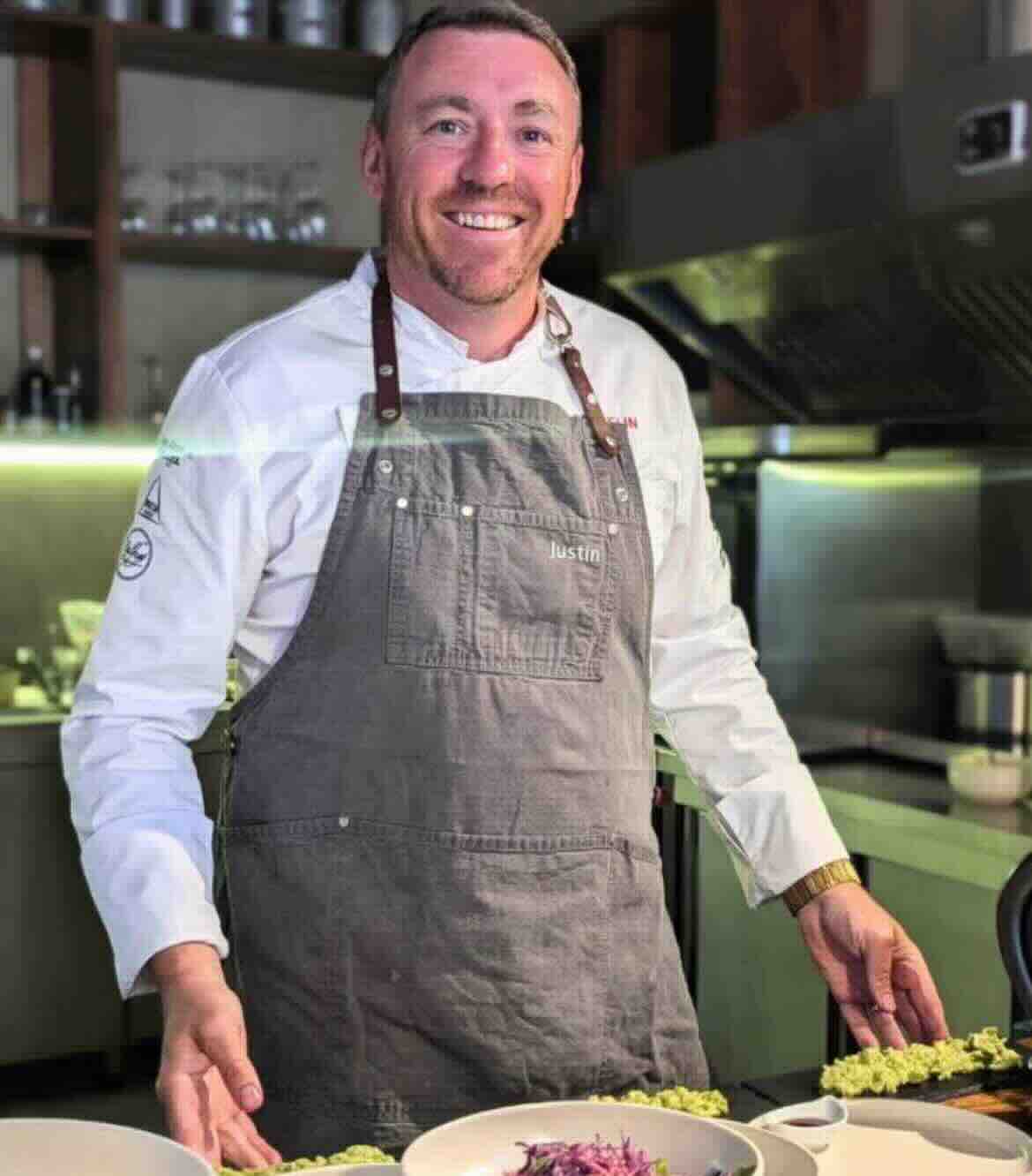 Chef Justin Jennings preparing dishes at Downunder restaurant Lisbon