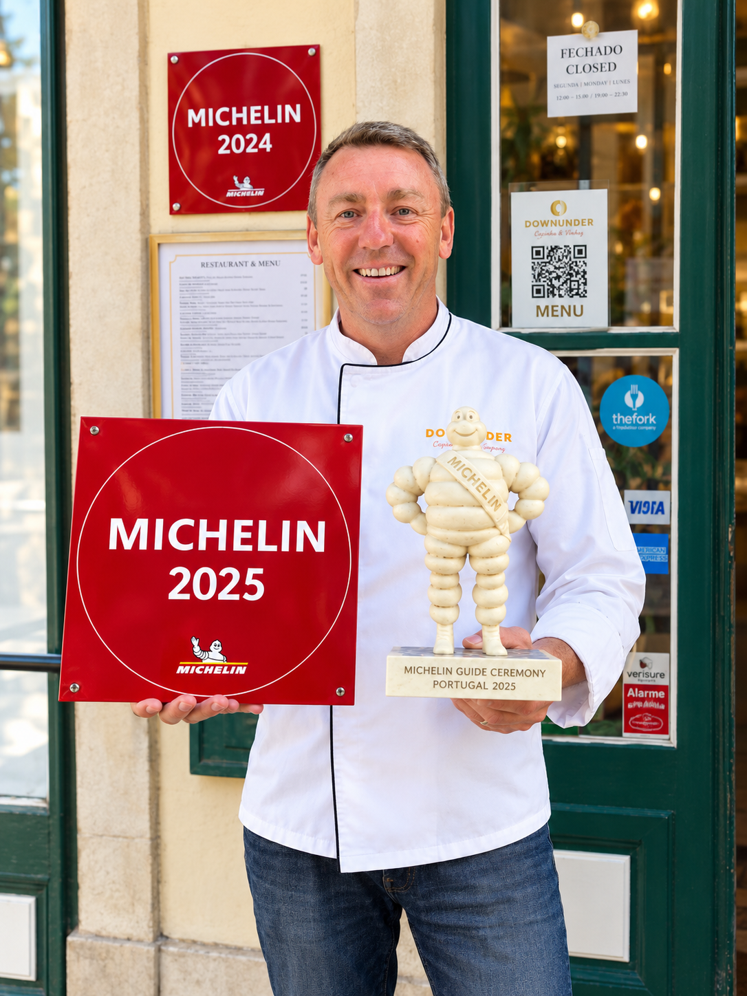 Chef Justin Jennings holding a MICHELIN Guide 2025 recognition plaque and Bibendum trophy outside Downunder by Justin Jennings.